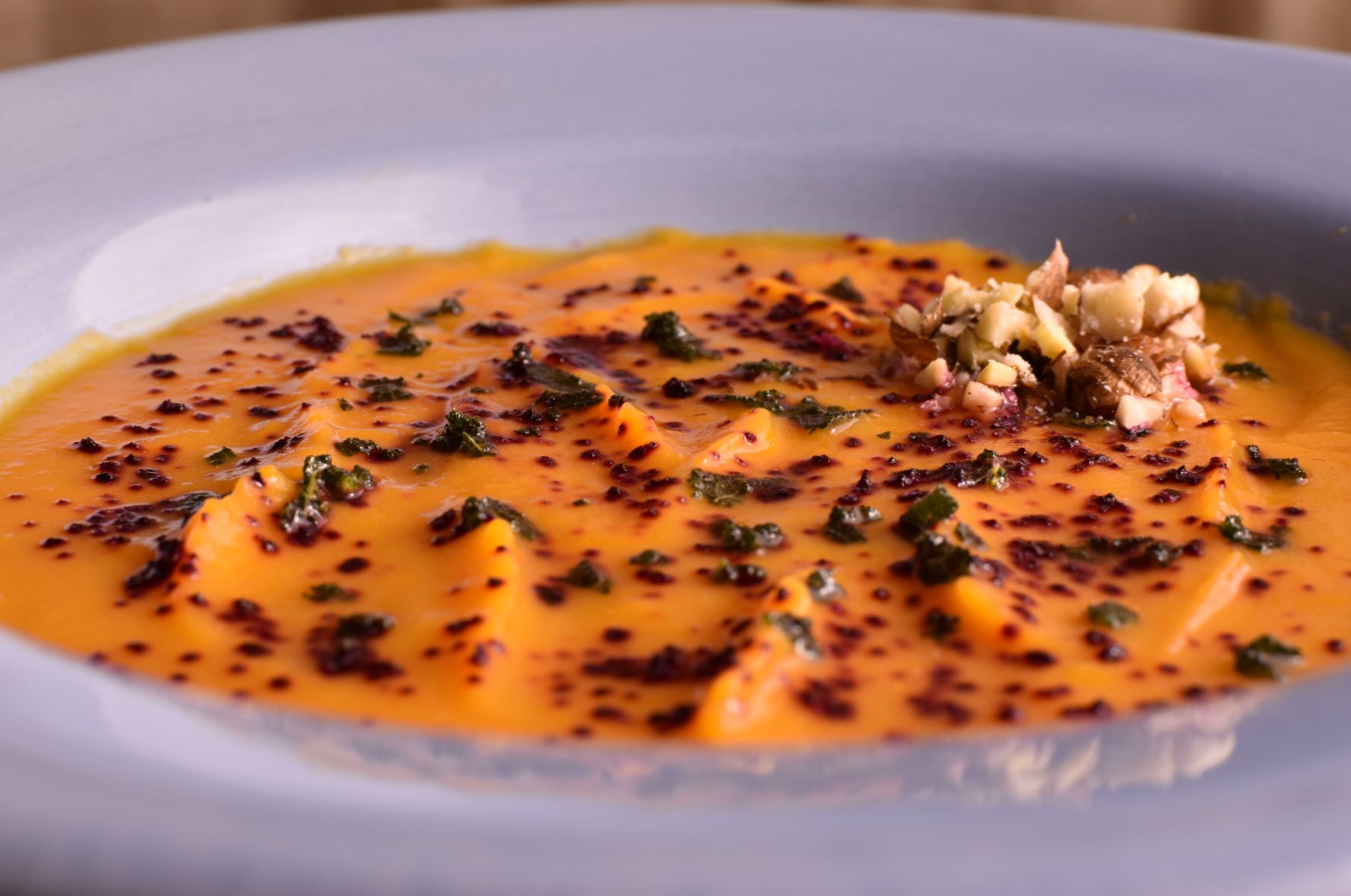 sweet potato soup with fried sage and beetroot powder