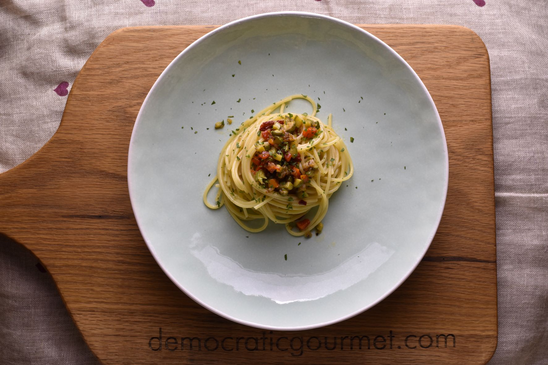 spaghetti with brunoise of peppers and zucchini