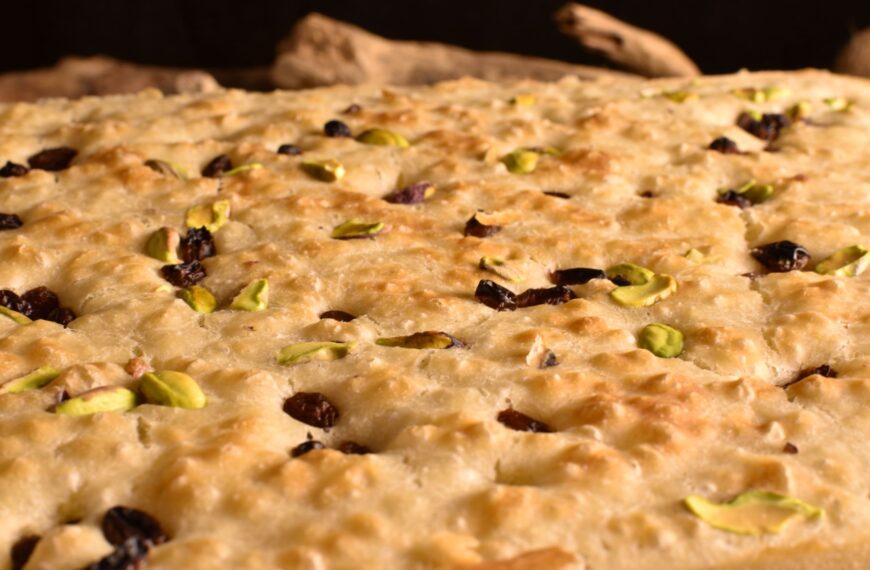 sweet focaccia with sultanas and pistachios