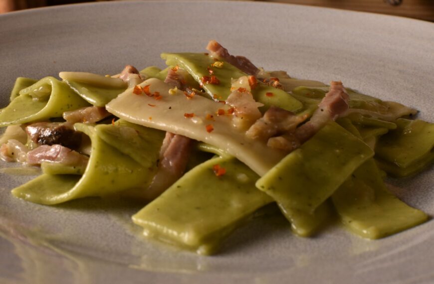 white and green maltagliati with guanciale and pepperoncino