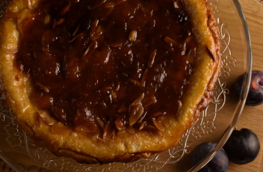 Upside-down tart with plum compote and toasted almonds