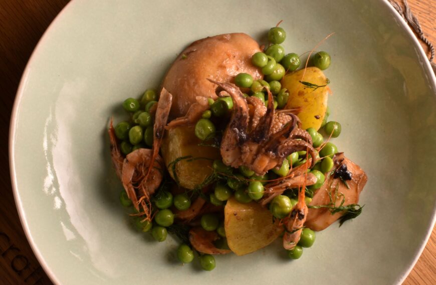 cuttlefish with green peas, shrimps and potatoes